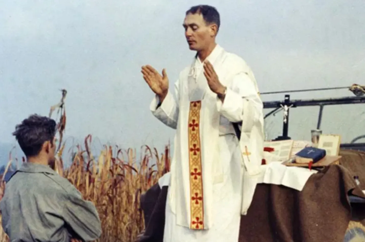 Father Emil Kapaun celebrates Mass using the hood of a Jeep as his altar on Oct. 7, 1950.?w=200&h=150